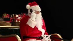 Father Christmas on his phone in the sleigh Stock Footage