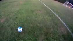 A soccer player kicks the ball out of bounds at the endline. Stock Footage