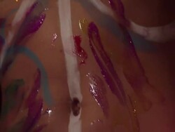 Group of women painting friend Stock Footage