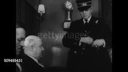 1936: U.S. TRAIN PASSENGER DRAMATIZATION: INT VS Male passenger talking to conductor about passing the Eastbound train (SOT). VS Train passing window, passing rare observation car. INT MS Conductor talking to passenger about train ride lengths (SOT). Instructional Video