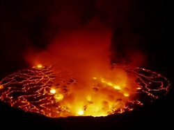 MS Shot of Molten rock cools and forms plates on surface of lava lake / Goma, Virunga National Park, Democratic Republic of the Congo Stock Footage