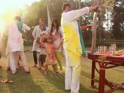 Indian joint family playing holi and dancing, Delhi, India Stock Footage