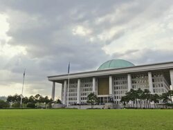 WS T/L National Assembly building in Yeouido Island / Seoul, South Korea Stock Footage