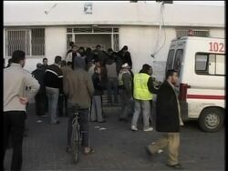 WRAP Smoke over Gaza, a'math of airstrike, hospital, KYounis airstrike, morgue News Clip