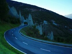 road traffic and Eroded glacial rock formations Stock Footage