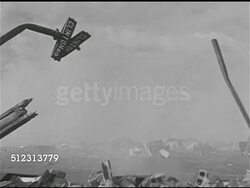 1951: WHAT-IF SCENARIO: SYRACUSE 'AFTER': Bent Clinton Square street sign, smoke FG. WS Dump w/ smoke & bent street sign. WS Dump road w/ smoke. Dump w/ door on ground, moving smoke, more junk debris. 1950s Sci-fi, Red Scare, McCarthyism, Armageddon. Instructional Video