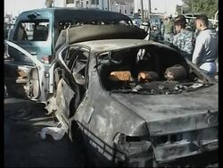 Car bomb at busy square kills at least 18, US military says News Clip