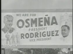 1946: PHILIPPINE PRESIDENTIAL ELECTION: VS Various political campaign banners & posters hanging in town, including 'Roxas & Quiring' & 'Osmena & Rodriguez.' VS Unidentified male speaker (no SOT), people voting at electoral precinct, stamping thumb. Instructional Video