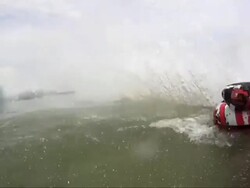 Men doing water sports stunts on lake Stock Footage