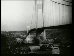 B/W 1940's bridge buckling + swaying in wind / Galloping Gertie / Tacoma Narrows Bridge / SOUND Stock Footage