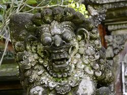 MS Stone carving god like figure at temple guardian / Ubud, Bali, Indonesia Stock Footage