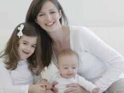 Caucasian mother with baby and little girl Stock Footage