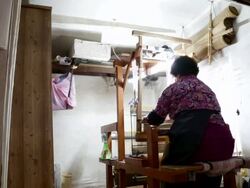 CU Shot of hand of woman using loom / Andong, Gyeongsangbuk do, South Korea  Stock Footage