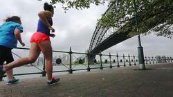 Two Women Running for Exercise By Sydney Harbour Stock Footage