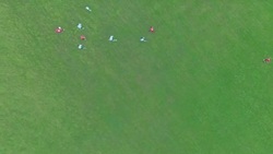 Aerial view of children playing soccer Stock Footage