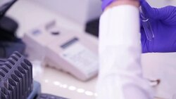 The bacteriologist is working with sample in laboratory Stock Footage