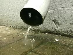Rain pattering out of Pipe \seamless LOOP HD\ Stock Footage
