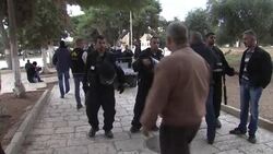 Police disperse Palestinians who threw rocks and firecrackers at officers at sensitive holy site News Clip