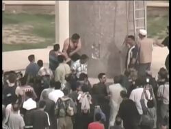 Statue of Saddam Hussein toppled in Firdos Square Stock Footage