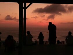 MS Silhouette of people at sunset from Mikazukiyama Observation deck of Chichi jima island, UNESCO World Natural Heritage Ogasawara Islands / Ogasawara Islands, Tokyo, Japan Stock Footage
