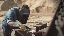 Man welding outside Stock Footage