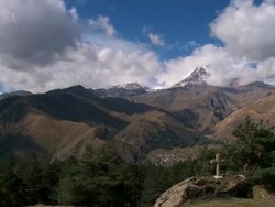 WS T/L cloud flowing over kazbegi mountains / Georgia Stock Footage