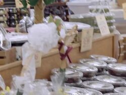 MS PAN from middle-aged couple to young couple shopping in health food store / Cabazon, California, USA Stock Footage