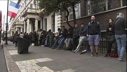 French citizens queue up outside of the French Embassy to cast their votes in the Presidential Election News Clip