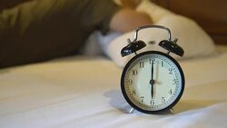 lazy to waking up from alarm clock Stock Footage