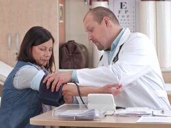 HD: Checking Patient's Blood Pressure Stock Footage