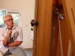 MS PAN Shot of artist working on his painting in his studio / Santa Fe, New Mexico, United States  Stock Footage