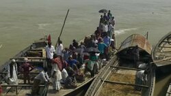 At a colourful monthly market families and traders converge by boat to barter sell and engage local produce and supplies in rural Bangladesh Stock Footage