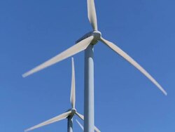 Wind turbine against blue sky, Spain Stock Footage