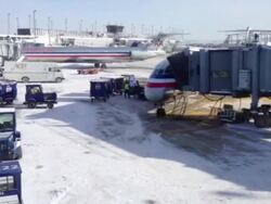 Chicago O'Hare Airport Grounded Planes in Snow News Clip