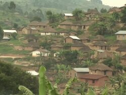 The view of the village houses in the mountains (PAN) Stock Footage