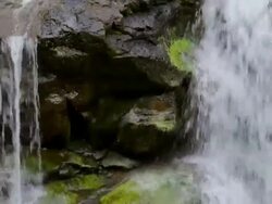 ECU TD Detail of Hoopii Falls and moss covered rocks / Kapaa, Kauai, Hawaii, United States Stock Footage