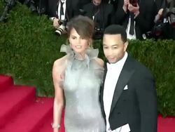 John Legend, Chrissy Teigen at 'Charles James: Beyond Fashion' Costume Institute Gala - Arrivals Stock Footage