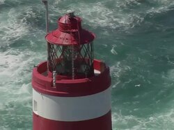 CU AERIAL DS ZO Shot of Casquets Lighthouse / Alderney, Channel Isles Stock Footage