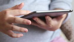 Pregnant woman using a tablet Stock Footage