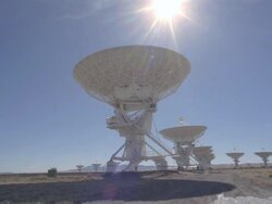  WS POV View of satellite dishes at Very Large Array in arid desert landscape / San Augustine, New Mexico, USA Stock Footage