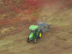WS ARIEAL View of Harvesting at field / Maine, United States Stock Footage