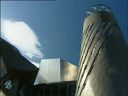Manchester, The Lowry exteriors showing tower and angularity of design; 2004; short sequence. Stock Footage