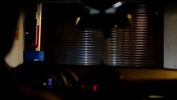 Car out of the underground garage Stock Footage