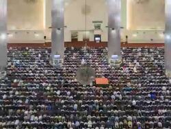 WS T/L Instiqal mosque, men praying during Friday prayers / Jakarta, Java, Indonesia Stock Footage