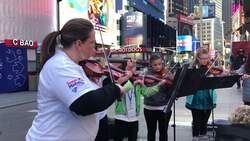 Students perform in Times Square as shutdown bites Instructional Video