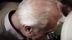 Grandfather and grandson with telescope Stock Footage