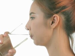 Woman drinking water Stock Footage