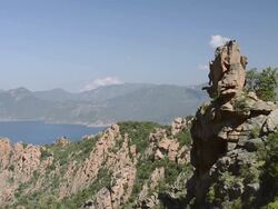 WS View over the fantastic rock landscape of the Calanche of Piana to the sea, UNESCO World Heritage Site / Gulf of Porto, Corsica, France Stock Footage