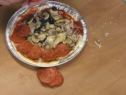 making a small pizza Stock Footage