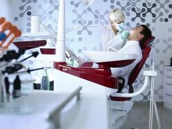 Young man in dentist office Stock Footage
